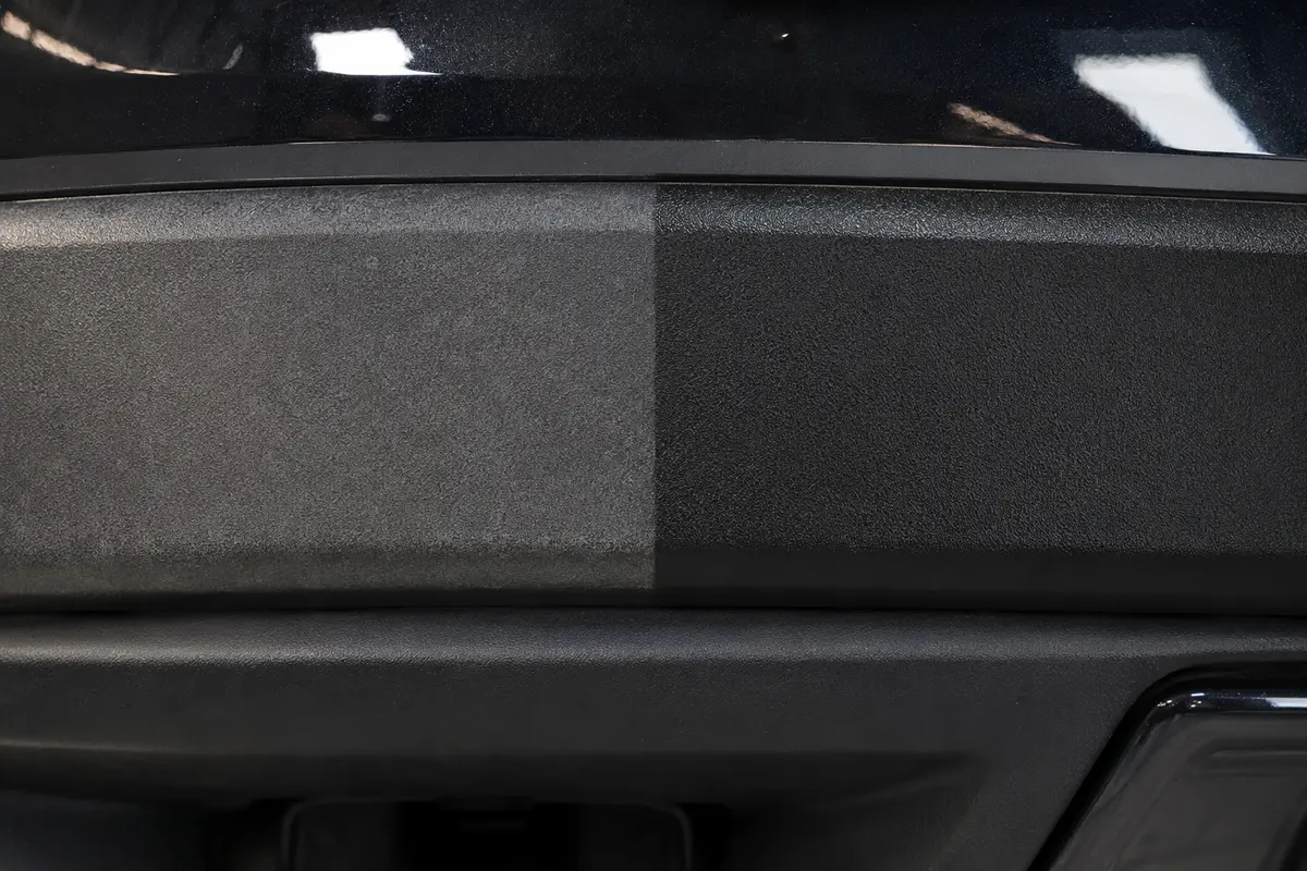Faded automotive trim beside ceramic-protected deep black trim